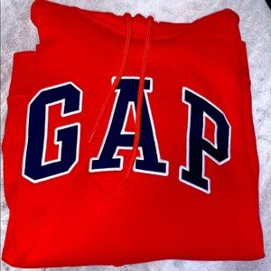 Orange gap hoodie with navy and white stitching